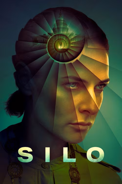 A close-up portrait of a woman with a serious expression, looking slightly to the right. Her face is illuminated with green and yellow tones, creating a dramatic and intense mood. Overlaid on her head is a spiral staircase that narrows toward the center, where a small figure of a person stands in front of a large domed building resembling the U.S. Capitol. The spiral staircase creates a visual effect of depth and introspection, symbolizing complex thoughts or a journey inward. Below the portrait, the word "SILO" is displayed in large, bold, pale green letters. The background is a gradient of dark green shades, complementing the overall mysterious and contemplative atmosphere of the image.
